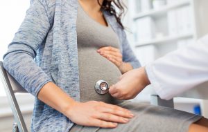 pregnant woman at doctors